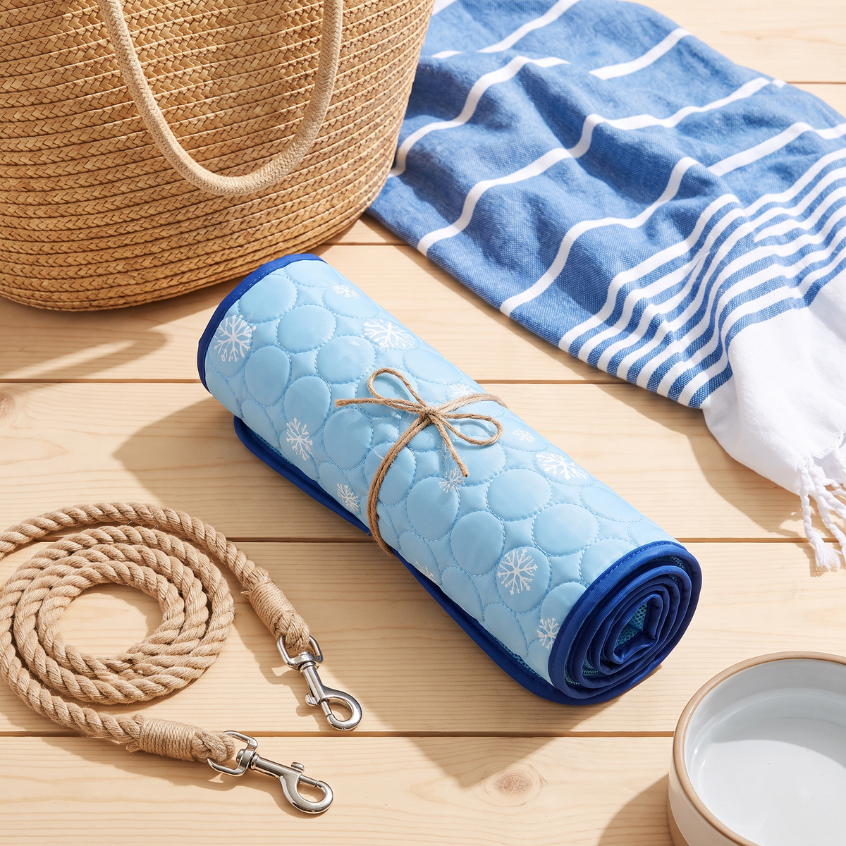 Frost Dog Cooling Mat rolled up for a beach trip