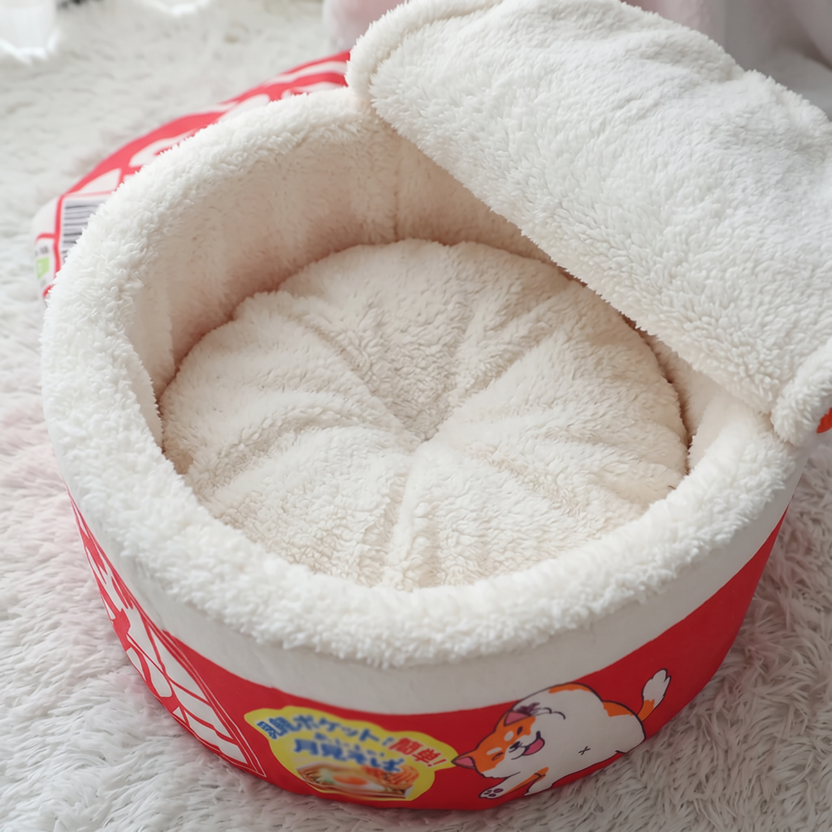 Twirl Fleece-Lined Noodle Cat Bed cushion close-up