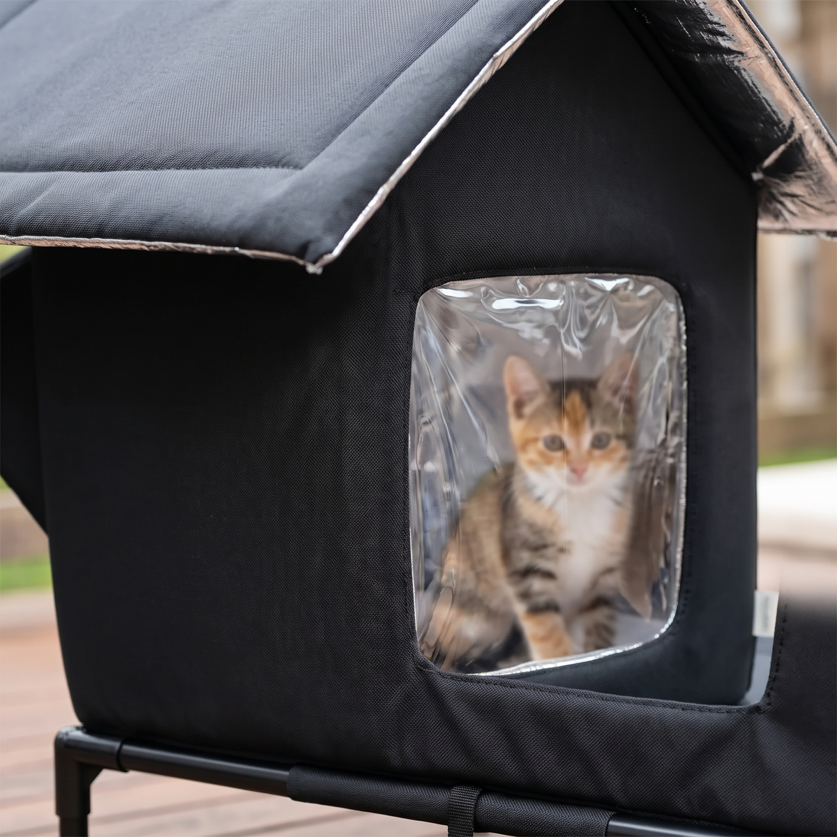 Haven Raised Weatherproof Pet House door flap close-up